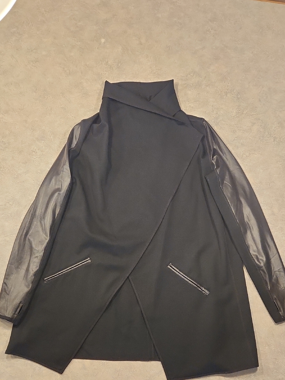SPANX Black Garment with Red Branded Tag